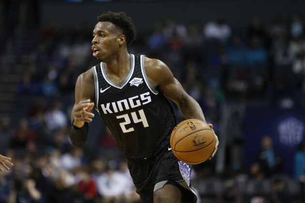 Sacramento Kings guard Buddy Hield brings the ball up court against the Charlotte Hornets in the second half of an NBA basketball game in Charlotte, N.C., Tuesday, Dec. 17, 2019. Charlotte defeated Sacramento 110-102. (AP Photo/Nell Redmond)