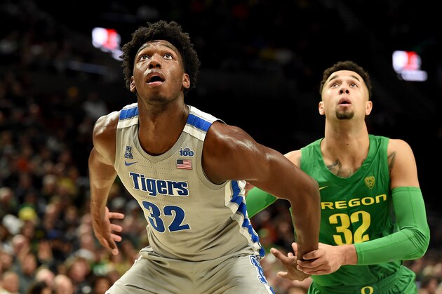 PORTLAND, OREGON - NOVEMBER 12: James Wiseman #32 of the Memphis Tigers and Anthony Mathis #32 of the Oregon Ducks battle for position during the second half of the game at Moda Center on November 12, 2019 in Portland, Oregon. Oregon won the game 82-74.  (Photo by Steve Dykes/Getty Images)