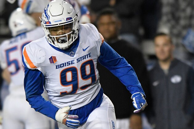PROVO, UT - OCTOBER 6: Curtis Weaver #99 of the Boise State Broncos celebrates a play during their game against the Brigham Young Cougars at LaVell Edwards Stadium on October 6, 2017 in Provo, Utah. (Photo by Gene Sweeney Jr./Getty Images)
