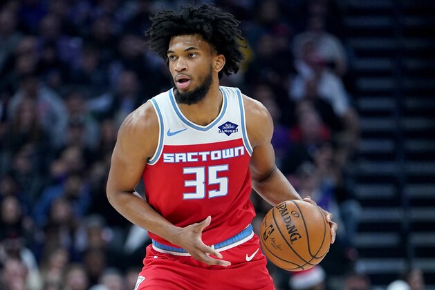 SACRAMENTO, CALIFORNIA - DECEMBER 23: Marvin Bagley III #35 of the Sacramento Kings looks to pass the ball against the Houston Rockets during the first half of an NBA basketball game at Golden 1 Center on December 23, 2019 in Sacramento, California. NOTE TO USER: User expressly acknowledges and agrees that, by downloading and or using this photograph, User is consenting to the terms and conditions of the Getty Images License Agreement. (Photo by Thearon W. Henderson/Getty Images)