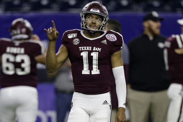 HOUSTON, TEXAS - DECEMBER 27: Kellen Mond #11 of the Texas A&M Aggies warms up before playing against the Oklahoma State Cowboys during the Academy Sports + Outdoors Texas Bowl at NRG Stadium on December 27, 2019 in Houston, Texas. (Photo by Bob Levey/Getty Images)