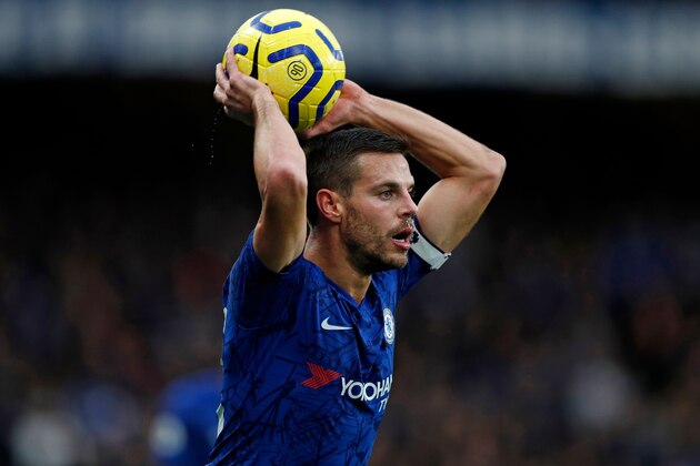 Chelsea's Spanish defender Cesar Azpilicueta takes a throw-in during the English Premier League football match between Chelsea and Southampton at Stamford Bridge in London on December 26, 2019. (Photo by Adrian DENNIS / AFP) / RESTRICTED TO EDITORIAL USE. No use with unauthorized audio, video, data, fixture lists, club/league logos or 'live' services. Online in-match use limited to 120 images. An additional 40 images may be used in extra time. No video emulation. Social media in-match use limited to 120 images. An additional 40 images may be used in extra time. No use in betting publications, games or single club/league/player publications. /  (Photo by ADRIAN DENNIS/AFP via Getty Images)