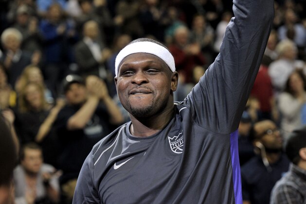 Sacramento Kings forward Zach Randolph waves to the crowd during a video tribute to by his former team the Memphis Grizzlies in the first half of an NBA basketball game between the two teams Friday, Jan. 19, 2018, in Memphis, Tenn. (AP Photo/Brandon Dill)