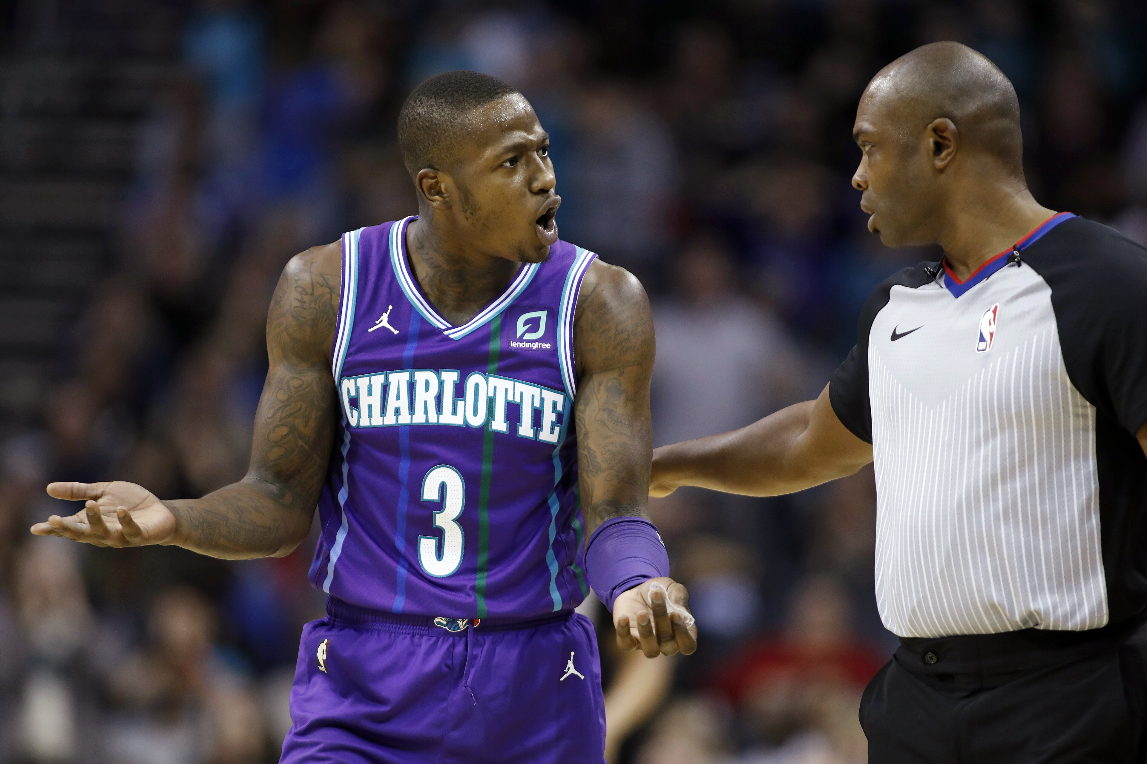 Charlotte Hornets' Terry Rozier (3) questions a call during the second half of the team's NBA basketball game against the Oklahoma City Thunder in Charlotte, N.C., Friday, Dec. 27, 2019. The Thunder won in overtime, 104-102. (AP Photo/Bob Leverone)