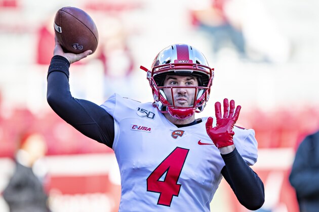 FAYETTEVILLE, AR - NOVEMBER 9:   Ty Storey #4 of the Western Kentucky Hilltoppers warms up before a game against the Arkansas Razorbacks at Razorback Stadium on November 9, 2019 in Fayetteville, Arkansas.  (Photo by Wesley Hitt/Getty Images)