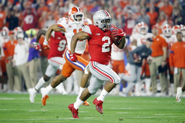 GLENDALE, ARIZONA - DECEMBER 28:  J.K. Dobbins #2 of the Ohio State Buckeyes runs the ball for 68-yard a touchdown against the Clemson Tigers in the first half during the College Football Playoff Semifinal at the PlayStation Fiesta Bowl at State Farm Stadium on December 28, 2019 in Glendale, Arizona. (Photo by Ralph Freso/Getty Images)