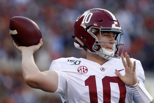 Alabama quarterback Mac Jones (10) throws a pass during the first half of an NCAA college football game against Auburn Saturday, Nov. 30, 2019, in Auburn, Ala. (AP Photo/Butch Dill)
