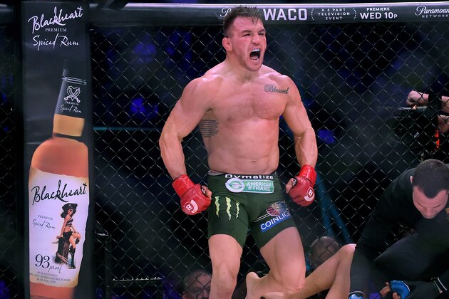 INGLEWOOD, CA - JANUARY 20:  Michael Chandler Jr (red gloves) celebrates after defeating Goiti Yamauchi (not pictured) in their Lightweight fight at Bellator 192 at The Forum on January 20, 2018 in Inglewood, California. Michael Chandler Jr won by unanimous decision.  (Photo by Jayne Kamin-Oncea/Getty Images)