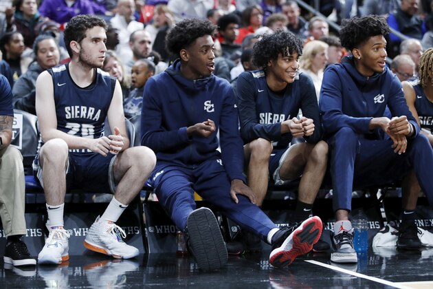 COLUMBUS, OH - DECEMBER 14: Zaire Wade of Sierra Canyon High School, son of former NBA great Dwyane Wade, looks on while sitting out with an injury during the Ohio Scholastic Play-By-Play Classic against St. Vincent-St. Mary High School at Nationwide Arena on December 14, 2019 in Columbus, Ohio. (Photo by Joe Robbins/Getty Images)