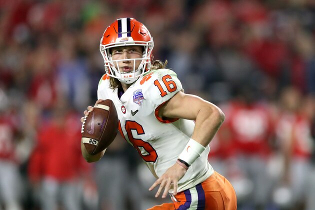 GLENDALE, ARIZONA - DECEMBER 28:  Trevor Lawrence #16 of the Clemson Tigers looks to pass against the Ohio State Buckeyes in the second half during the College Football Playoff Semifinal at the PlayStation Fiesta Bowl at State Farm Stadium on December 28, 2019 in Glendale, Arizona. (Photo by Matthew Stockman/Getty Images)