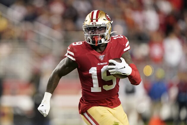 San Francisco 49ers wide receiver Deebo Samuel runs with the ball against the Los Angeles Rams during the first half of an NFL football game in Santa Clara, Calif., Saturday, Dec. 21, 2019. (AP Photo/Tony Avelar)