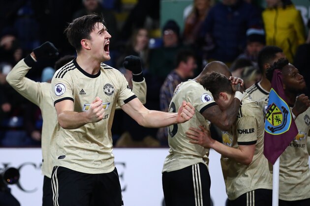 BURNLEY, ENGLAND - DECEMBER 28: Harry Maguire of Manchester United celebrates after team mate Marcus Rashford has scored their second goal during the Premier League match between Burnley FC and Manchester United at Turf Moor on December 28, 2019 in Burnley, United Kingdom. (Photo by Clive Brunskill/Getty Images) BURNLEY, ENGLAND - DECEMBER 28: Harry Maguire of Manchester United celebrates after team mate Marcus Rashford has scored their second goal during the Premier League match between Burnley FC and Manchester United at Turf Moor on December 28, 2019 in Burnley, United Kingdom. (Photo by Clive Brunskill/Getty Images)