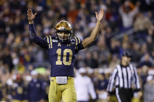 Navy's Malcolm Perry celebrates after a touchdown during the second half of an NCAA college football game against Army, Saturday, Dec. 14, 2019, in Philadelphia. (AP Photo/Matt Slocum)