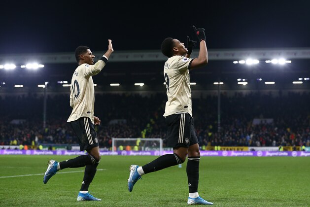 BURNLEY, ENGLAND - DECEMBER 28:  Anthony Martial of Manchester United celebrates with teammate Marcus Rashford after scoring his teams first goal during the Premier League match between Burnley FC and Manchester United at Turf Moor on December 28, 2019 in Burnley, United Kingdom. (Photo by Jan Kruger/Getty Images)