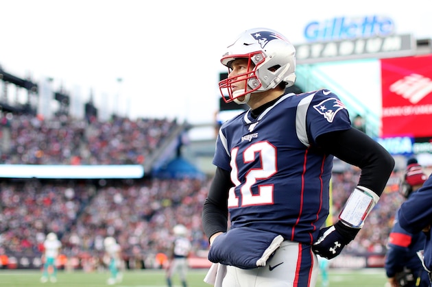FOXBOROUGH, MASSACHUSETTS - DECEMBER 29: Tom Brady #12 of the New England Patriots looks on from the sideline during the game against the Miami Dolphins  at Gillette Stadium on December 29, 2019 in Foxborough, Massachusetts. The Dolphins defeat the Patriots 27-24.  (Photo by Maddie Meyer/Getty Images)