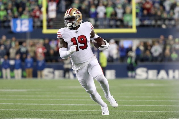 SEATTLE, WASHINGTON - DECEMBER 29: Wide receiver Deebo Samuel #19 of the San Francisco 49ers runs in a touchdown against the Seattle Seahawks during the first quarter of the game at CenturyLink Field on December 29, 2019 in Seattle, Washington. (Photo by Abbie Parr/Getty Images)