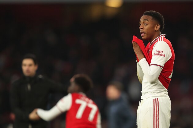 LONDON, ENGLAND - DECEMBER 29: Joe Willock of Arsenal dejected at full time of the Premier League match between Arsenal FC and Chelsea FC at Emirates Stadium on December 29, 2019 in London, United Kingdom. (Photo by James Williamson - AMA/Getty Images)