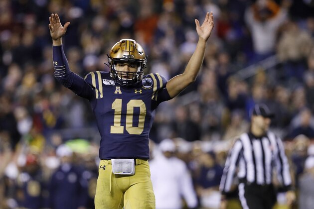 Navy's Malcolm Perry celebrates after a touchdown during the second half of an NCAA college football game against Army, Saturday, Dec. 14, 2019, in Philadelphia. (AP Photo/Matt Slocum)