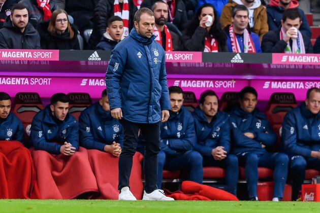 MUNICH, GERMANY - DECEMBER 21: (BILD ZEITUNG OUT) head coach Hansi Flick of FC Bayern Muenchen looks on during the Bundesliga match between FC Bayern Muenchen and VfL Wolfsburg at Allianz Arena on December 21, 2019 in Munich, Germany. (Photo by TF-Images/Getty Images)
