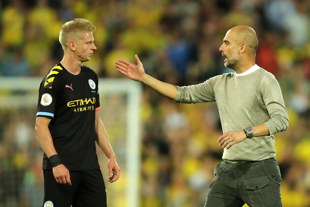 NORWICH, ENGLAND - SEPTEMBER 14: Pep Guardiola, Manager of Manchester City consoles Oleksandr Zinchenko of Manchester City  after the Premier League match between Norwich City and Manchester City at Carrow Road on September 14, 2019 in Norwich, United Kingdom. (Photo by Marc Atkins/Getty Images)