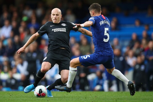 LONDON, ENGLAND - SEPTEMBER 28: Aaron Mooy of Brighton and Hove Albion is challenged by Jorginho of Chelsea during the Premier League match between Chelsea FC and Brighton & Hove Albion at Stamford Bridge on September 28, 2019 in London, United Kingdom. (Photo by Julian Finney/Getty Images)