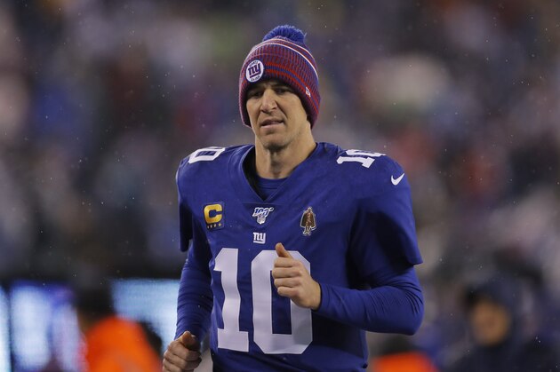 New York Giants quarterback Eli Manning (10) runs on the sideline in the second half of an NFL football game against Philadelphia Eagles on Sunday, Dec. 29, 2019, in East Rutherford, N.J. (AP Photo/Adam Hunger)