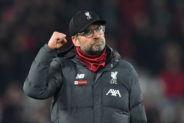 Liverpool's German manager Jurgen Klopp gestures at the end of the English Premier League football match between Liverpool and Wolverhampton Wanderers at Anfield in Liverpool, north west England, on December 29, 2019. (Photo by Paul ELLIS / AFP) / RESTRICTED TO EDITORIAL USE. No use with unauthorized audio, video, data, fixture lists, club/league logos or 'live' services. Online in-match use limited to 120 images. An additional 40 images may be used in extra time. No video emulation. Social media in-match use limited to 120 images. An additional 40 images may be used in extra time. No use in betting publications, games or single club/league/player publications. /  (Photo by PAUL ELLIS/AFP via Getty Images)