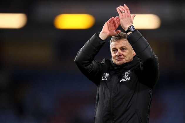 BURNLEY, ENGLAND - DECEMBER 28: Ole Gunnar Solskjaer the head coach / manager of Manchester United applauds the fans during the Premier League match between Burnley FC and Manchester United at Turf Moor on December 28, 2019 in Burnley, United Kingdom. (Photo by Robbie Jay Barratt - AMA/Getty Images)
