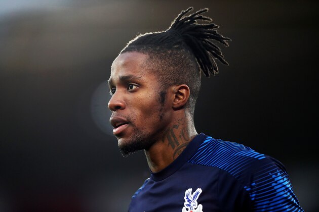 SOUTHAMPTON, ENGLAND - DECEMBER 28: Wilfried Zaha of Crystal Palace looks on during warm ups ahead of the Premier League match between Southampton FC and Crystal Palace at St Mary's Stadium on December 28, 2019 in Southampton, United Kingdom. (Photo by Naomi Baker/Getty Images)
