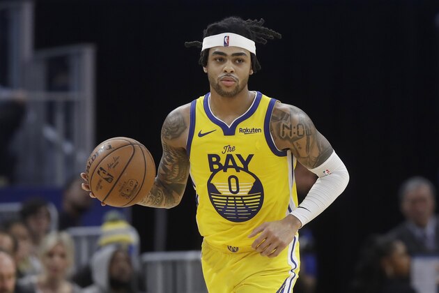 Golden State Warriors guard D'Angelo Russell (0) dribbles upcourt against the Dallas Mavericks during the second half of an NBA basketball game in San Francisco, Saturday, Dec. 28, 2019. (AP Photo/Jeff Chiu)