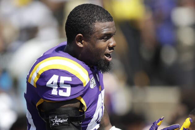 LSU linebacker Michael Divinity Jr. stands on the sideline in the first half of an NCAA college football game against Vanderbilt Saturday, Sept. 21, 2019, in Nashville, Tenn. (AP Photo/Mark Humphrey)