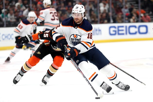 ANAHEIM, CALIFORNIA - NOVEMBER 10:  James Neal #18 of the Edmonton Oilers controls the puck during the first period of a game against the Anaheim Ducks at Honda Center on November 10, 2019 in Anaheim, California. (Photo by Sean M. Haffey/Getty Images)