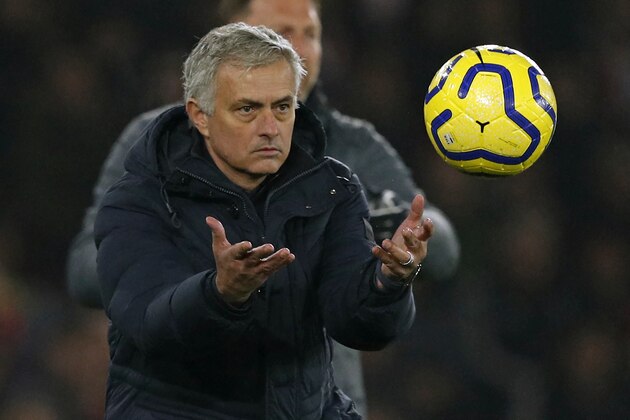 Tottenham Hotspur's Portuguese head coach Jose Mourinho returns the ball during the English Premier League football match between Southampton and Tottenham at St Mary's Stadium in Southampton, southern England on January 1, 2020. (Photo by Adrian DENNIS / AFP) / RESTRICTED TO EDITORIAL USE. No use with unauthorized audio, video, data, fixture lists, club/league logos or 'live' services. Online in-match use limited to 120 images. An additional 40 images may be used in extra time. No video emulation. Social media in-match use limited to 120 images. An additional 40 images may be used in extra time. No use in betting publications, games or single club/league/player publications. /  (Photo by ADRIAN DENNIS/AFP via Getty Images)