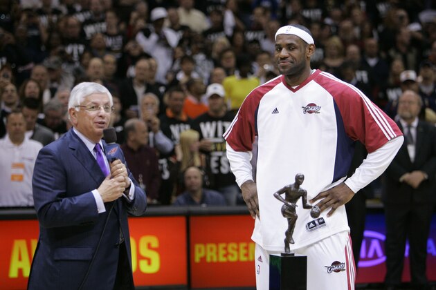 NBA Commissioner David Stern, left, presents Cleveland Cavaliers' LeBron James with the 2008-2009 MVP trophy before an Eastern Conference semifinal basketball game against the Atlanta Hawks Tuesday, May 5, 2009, in Cleveland. (AP Photo/Mark Duncan)
