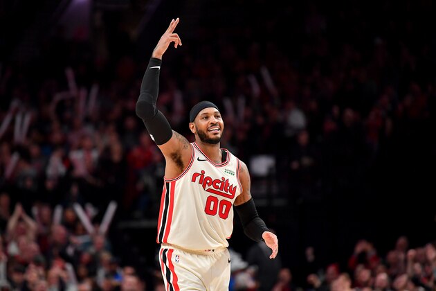 PORTLAND, OREGON - DECEMBER 30: Carmelo Anthony #00 of the Portland Trail Blazers reacts to a play during the second half of the game against the Phoenix Suns at the Moda Center on December 30, 2019 in Portland, Oregon. The Phoenix Suns top the Portland Trail Blazers 122-116. NOTE TO USER: User expressly acknowledges and agrees that, by downloading and or using this photograph, User is consenting to the terms and conditions of the Getty Images License Agreement. (Photo by Alika Jenner/Getty Images)