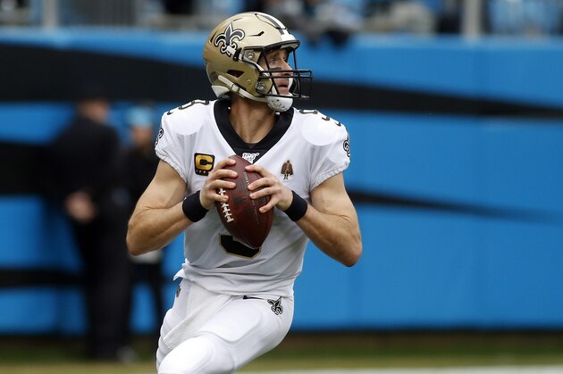New Orleans Saints quarterback Drew Brees (9) looks to pass against the Carolina Panthers during the first half of an NFL football game in Charlotte, N.C., Sunday, Dec. 29, 2019. (AP Photo/Brian Blanco)
