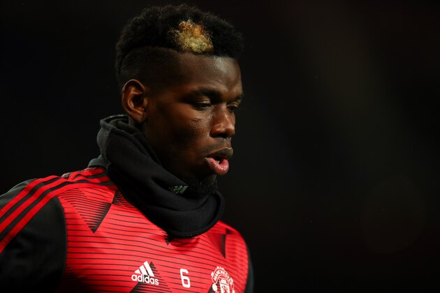 MANCHESTER, ENGLAND - DECEMBER 26: Paul Pogba of Manchester United warms up during the Premier League match between Manchester United and Newcastle United at Old Trafford on December 26, 2019 in Manchester, United Kingdom. (Photo by Robbie Jay Barratt - AMA/Getty Images)