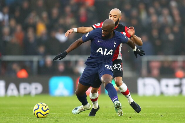 SOUTHAMPTON, ENGLAND - JANUARY 01: Nathan Redmond of Southampton battles for possession with Tanguy Ndombele of Tottenham Hotspur during the Premier League match between Southampton FC and Tottenham Hotspur at St Mary's Stadium on January 01, 2020 in Southampton, United Kingdom. (Photo by Dan Istitene/Getty Images)