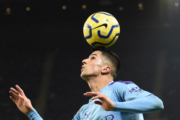Manchester City's Portuguese defender Joao Cancelo controls the ball during the English Premier League football match between Manchester City and Everton at the Etihad Stadium in Manchester, north west England, on January 1, 2020. (Photo by Oli SCARFF / AFP) / RESTRICTED TO EDITORIAL USE. No use with unauthorized audio, video, data, fixture lists, club/league logos or 'live' services. Online in-match use limited to 120 images. An additional 40 images may be used in extra time. No video emulation. Social media in-match use limited to 120 images. An additional 40 images may be used in extra time. No use in betting publications, games or single club/league/player publications. /  (Photo by OLI SCARFF/AFP via Getty Images)