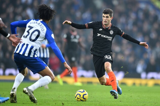 Brighton's Brazilian midfielder Bernardo (L) watches Chelsea's US midfielder Christian Pulisic during the English Premier League football match between Brighton and Hove Albion and Chelsea at the American Express Community Stadium in Brighton, southern England on January 1, 2020. (Photo by Glyn KIRK / AFP) / RESTRICTED TO EDITORIAL USE. No use with unauthorized audio, video, data, fixture lists, club/league logos or 'live' services. Online in-match use limited to 120 images. An additional 40 images may be used in extra time. No video emulation. Social media in-match use limited to 120 images. An additional 40 images may be used in extra time. No use in betting publications, games or single club/league/player publications. /  (Photo by GLYN KIRK/AFP via Getty Images)