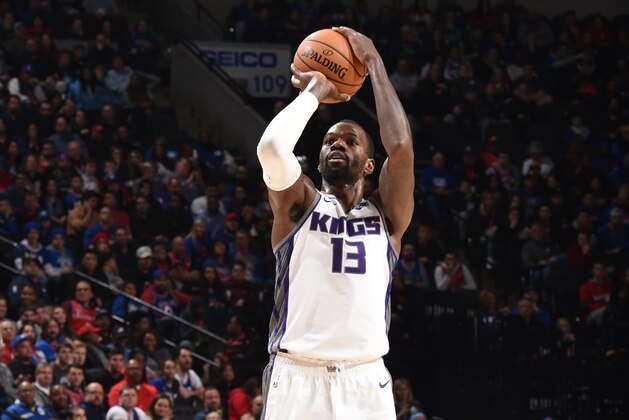 PHILADELPHIA, PA - NOVEMBER 27: Dewayne Dedmon #13 of the Sacramento Kings shoots a three-pointer against the Philadelphia 76ers on November 27, 2019 at the Wells Fargo Center in Philadelphia, Pennsylvania NOTE TO USER: User expressly acknowledges and agrees that, by downloading and/or using this Photograph, user is consenting to the terms and conditions of the Getty Images License Agreement. Mandatory Copyright Notice: Copyright 2019 NBAE (Photo by David Dow/NBAE via Getty Images)