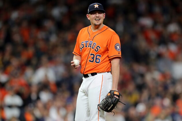 HOUSTON, TEXAS - OCTOBER 30:  Will Harris #36 of the Houston Astros reacts after allowing a two-run home run to Howie Kendrick (not pictured) of the Washington Nationals during the seventh inning in Game Seven of the 2019 World Series at Minute Maid Park on October 30, 2019 in Houston, Texas. (Photo by Elsa/Getty Images)