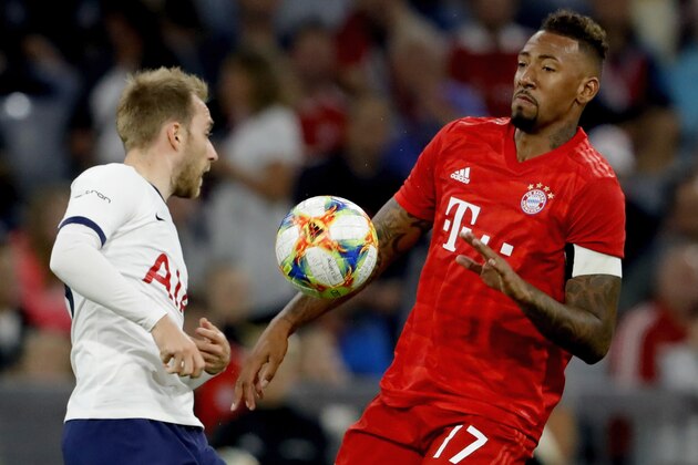 MUNICH, GERMANY - JULY 31: (L-R) Christian Eriksen of Tottenham Hotspur, Jerome Boateng of Bayern Munchen  during the Audi Cup  match between Tottenham Hotspur v Bayern Munchen at the Allianz Arena on July 31, 2019 in Munich Germany (Photo by Rico Brouwer/Soccrates/Getty Images)