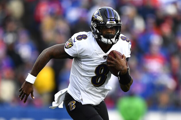 Baltimore Ravens quarterback Lamar Jackson (8) carries the ball during the second half of an NFL football game against the Buffalo Bills in Orchard Park, N.Y., Sunday, Dec. 8, 2019. (AP Photo/Adrian Kraus)