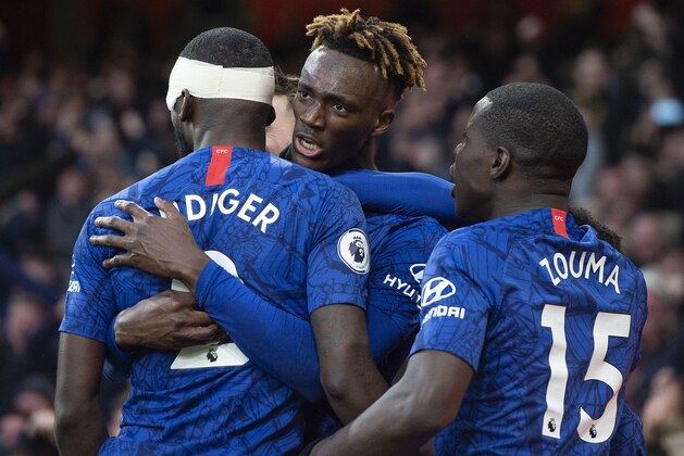 LONDON, ENGLAND - DECEMBER 29: Tammy Abraham of Chelsea celebrates scoring the winning goal with Antonio Rudiger and N'Golo Kante during to the Premier League match between Arsenal FC and Chelsea FC at Emirates Stadium on December 29, 2019 in London, United Kingdom. (Photo by Visionhaus)