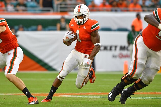 MIAMI, FL - SEPTEMBER 22: Lorenzo Lingard #1 of the Miami Hurricanes runs with the ball against the Florida International Golden Panthers at Hard Rock Stadium on September 22, 2018 in Miami, Florida. (Photo by Mark Brown/Getty Images)