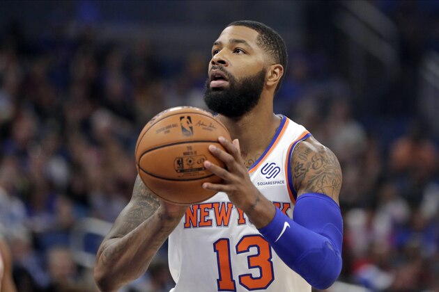 New York Knicks' Marcus Morris shoots a free throw against the Orlando Magic during the first half of an NBA basketball game, Wednesday, Oct. 30, 2019, in Orlando, Fla. (AP Photo/John Raoux)