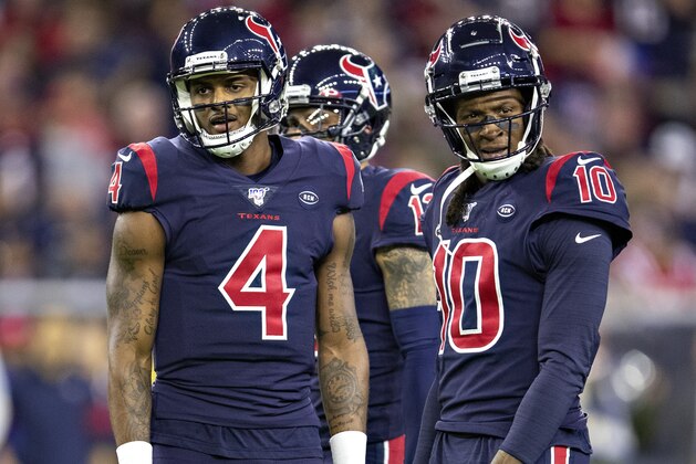 HOUSTON, TX - DECEMBER 1:  Deshaun Watson #4 and DeAndre Hopkins #10 of the Houston Texans on the field during the first half of a game against the New England Patriots at NRG Stadium on December 1, 2019 in Houston, Texas.  The Texans defeated the Patriots 28-22.  (Photo by Wesley Hitt/Getty Images)