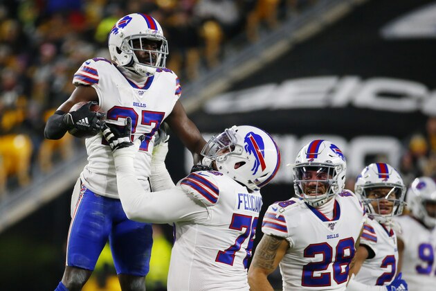 PITTSBURGH, PENNSYLVANIA - DECEMBER 15: Tre'Davious White #27 of the Buffalo Bills celebrates with teammates after intercepting a pass during the first quarter against the Pittsburgh Steelers in the game at Heinz Field on December 15, 2019 in Pittsburgh, Pennsylvania. (Photo by Justin K. Aller/Getty Images)