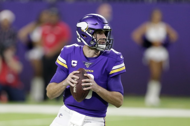 Minnesota Vikings quarterback Kirk Cousins throws a pass during the first half of an NFL football game against the Green Bay Packers, Monday, Dec. 23, 2019, in Minneapolis. (AP Photo/Andy Clayton-King)